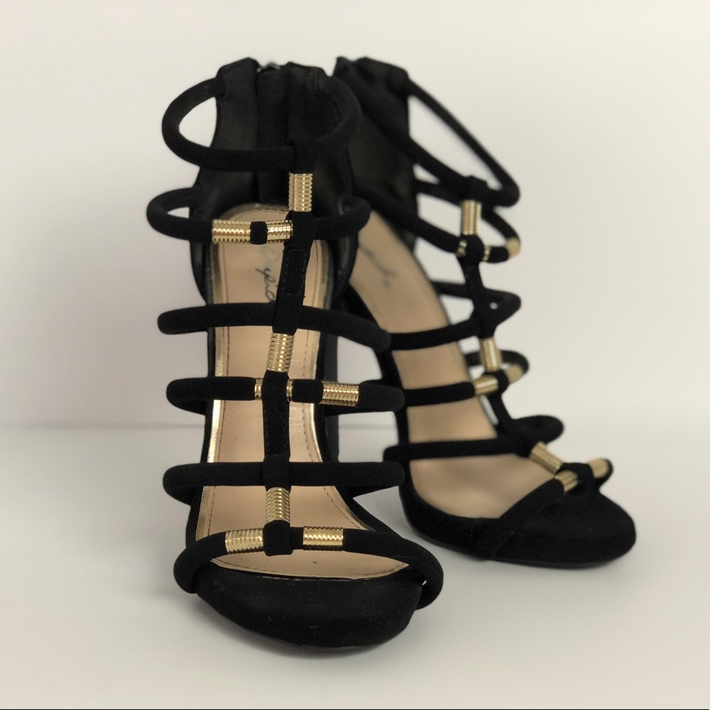 Black strap heels with gold accents size 6